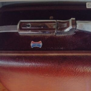 Classic American Tourister Brown Leather Suitcase with Chrome Hardware